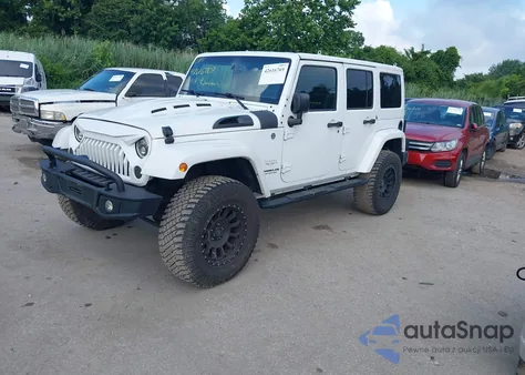 2015 Jeep Wrangler Unlimited Sahara из США, поврежденный, VIN 1C4BJWEG9FL701027
